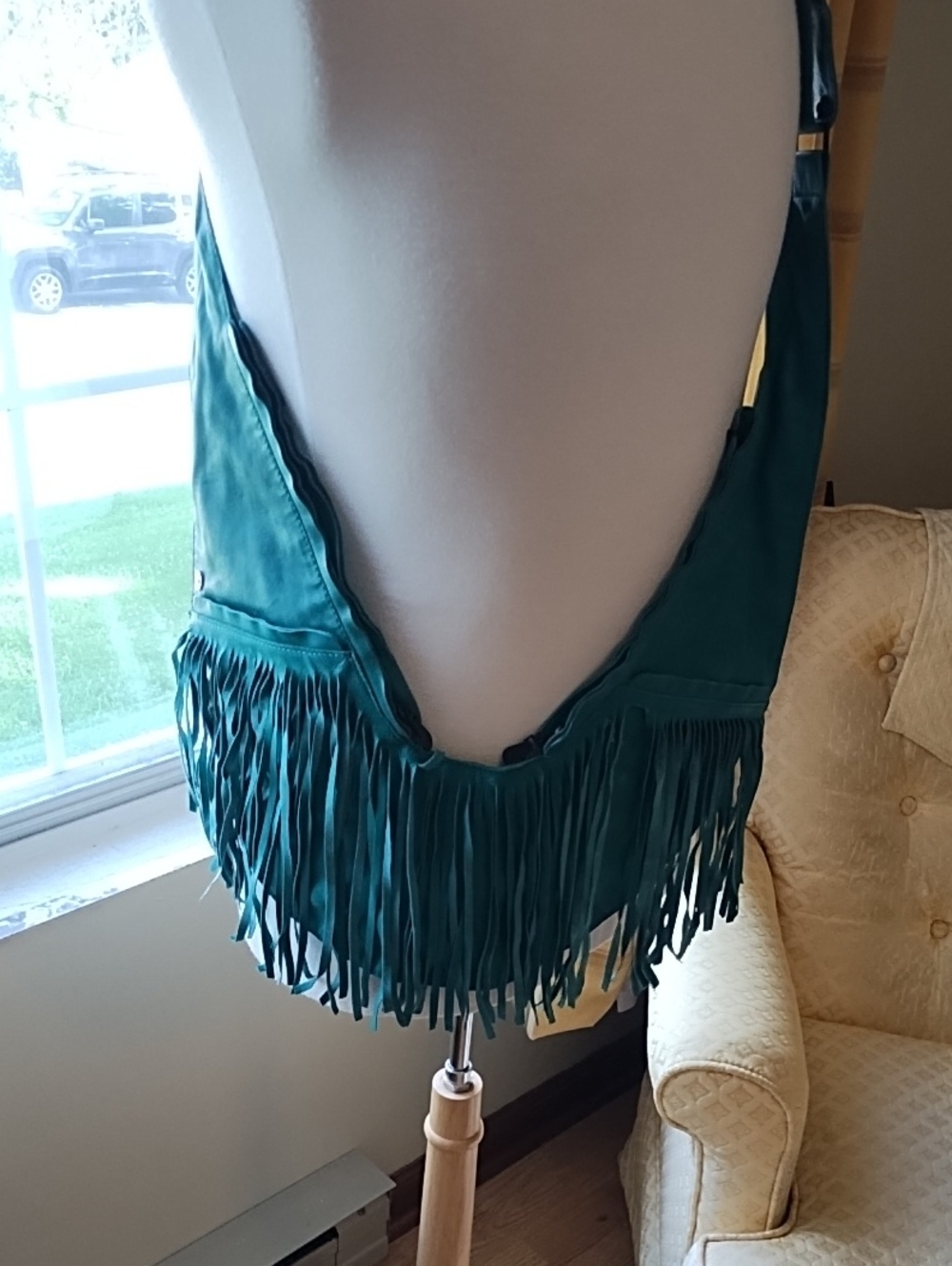 Sash Turquoise leather bag with fringe